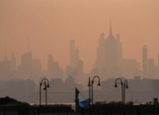 Según los meteorólogos, las tormentas eléctricas despejarán el humo de los incendios forestales del noreste antes de la final de la Copa del Mundo.